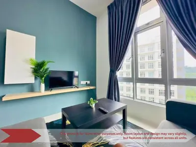 a living room with a couch and a large window at Anderson Heritage Suites - Ipoh in Ipoh
