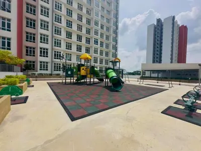 a playground in front of a large building at Anderson Heritage Suites - Ipoh in Ipoh
