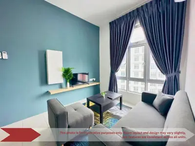 a living room with a couch and a window at Anderson Heritage Suites - Ipoh in Ipoh