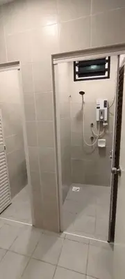 a bathroom with a shower stall with a toilet at Homestay Bandar Puteri Jaya in Sungai Petani