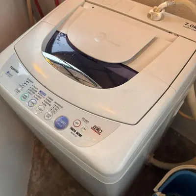 a toaster oven sitting on top of a counter at Cozy Corner Home Alma Near AEON \u5927\u5c71\u811a\u6e29\u99a8\u6c11\u5bbf in Bukit Mertajam