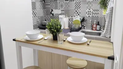 a kitchen counter with two bowls and a sink at IFS Seri Iskandar by Glex in Seri Iskandar