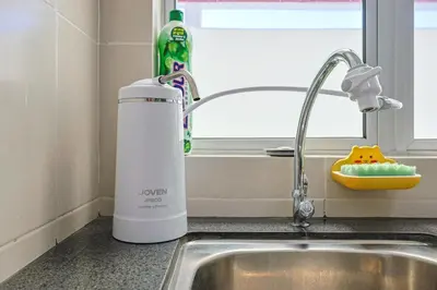a juicer sitting next to a kitchen sink at Minion Escap Family Homestay in Brinchang Cameron Highland Clover Home 9-25 in Brinchang