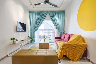 a living room with a couch and a tv at Cozy Premium Family Homestay in Cameron Highlands Brinchang Clover Home 4-06 in Brinchang