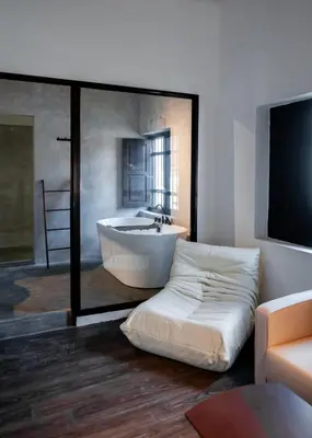 a large bathroom with a tub and a large mirror at Heritage Villa by Aayu - 10 mins walk to Armenian St in George Town