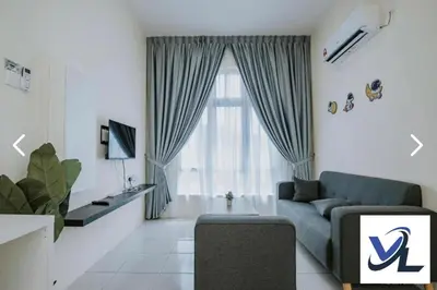 a living room with a couch and a window at Close Dun Book in Ipoh