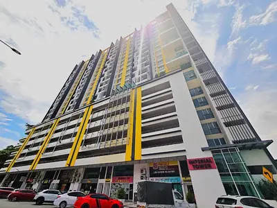 a tall building with cars parked in front of it at Majestic The Imperial Tower - Ipoh in Ipoh