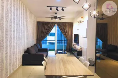 a living room with a table and a couch at The Majestic Condo Ipoh Home Fairy 3 in Ipoh