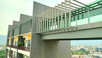 a building with stairs on the side of it at Ipoh Majestic 2 Bedrooms 4Pax Modern Apartment by City Home Empire in Ipoh