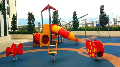 a playground with a slide in a park at Ipoh Majestic 2 Bedrooms 4Pax Modern Apartment by City Home Empire in Ipoh