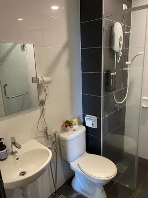 a bathroom with a toilet and a sink at JS Ipoh Homestay 2 At The Majestic Ipoh in Ipoh