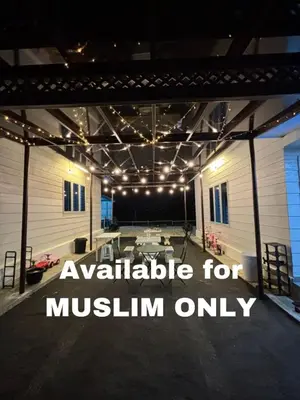 a large room with a stage with lights on it at Idaman Cottage Sekinchan in Tanjung Karang