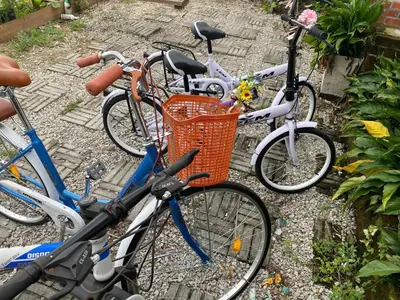 a group of bikes parked next to each other at Homestay Damai D'Sawah in Kampong Parit Fourteen