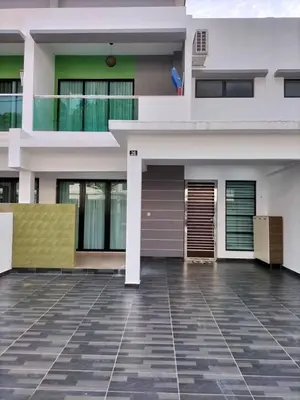 a large white house with a tiled floor at L26 happy homestay in Kampong Sungai Udang