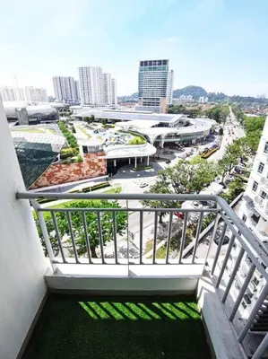 a view of a city from a balcony of a building at Tur -Weeks Stay-3rooms Private House in Bayan Lepas