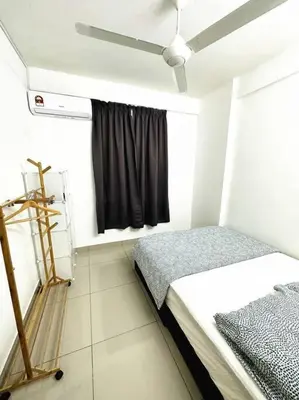 a small bedroom with a bed and a window at Tur -Weeks Stay-3rooms Private House in Bayan Lepas