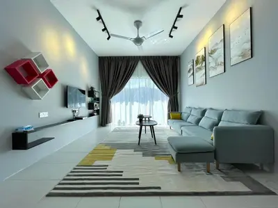 a living room with a couch and a table at Space of Tranquility Quintet in Tanah Rata