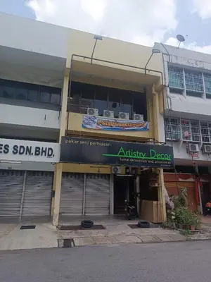 an apartment building with an entrance to an affinity door at Jstay guesthouse in George Town