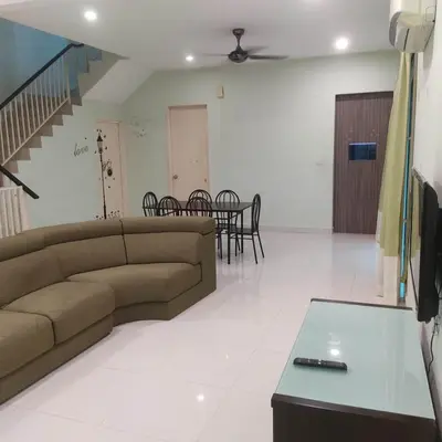 a living room with a couch and a table at WeJDAN TWO POINT O WHOLE HOUSE BUT BUDGET PARTIAL BOOKING 2ROOMS 2BATHROOMS AND NEVER MIX WITH OTHERS AND YOUR TEAM ONLY BALIK PULAU, PENANG ISLAND in Balik Pulau