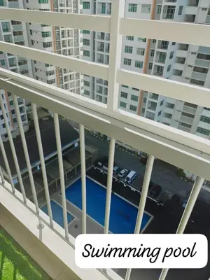 an aerial view of a building with a swimming pool at Meeymohd Homestay in Ipoh