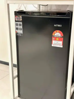 a refrigerator with a sticker on the side of it at URBAN Suites Modern Pinky 6pax 3queen 3Bedroom 2Bathroom 2Carpark with Infinity Pool in Jelutong
