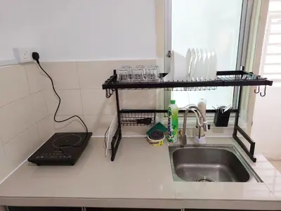 a kitchen counter with a sink and a shelf at TuR05-Pisa Stadium-3room-Private in Bayan Lepas