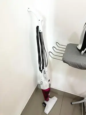 a kitchen utensil holder in the corner of a room at TuR05-Pisa Stadium-3room-Private in Bayan Lepas
