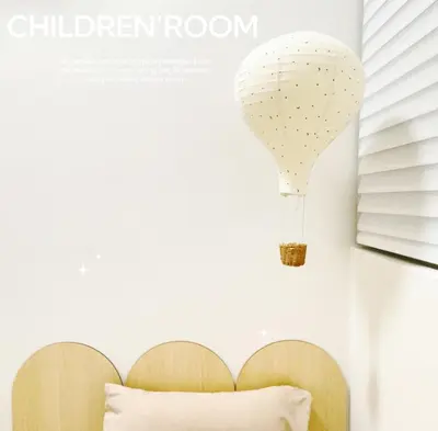 a magazine cover with a hot air balloon on the wall at Georgetown Seaview & Cityview Skypool with 2 Carpark in Jelutong