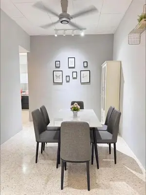 a dining room with a white table and chairs at Mk&V butterworth in Butterworth