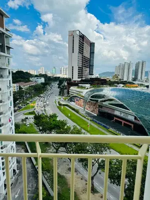 a view of a city from a balcony at Spc Arena Apartment Service in Bayan Lepas