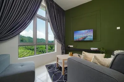 a living room with a couch and a window at Anderson Mountain View by Xuites-6 Pax-Free Netflix-6 mins to Concubine Lane in Ipoh