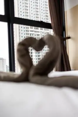 a heart shaped object sitting on a window sill at UA19 #3BR 3 Queen Bed #Family Staycation in Jelutong