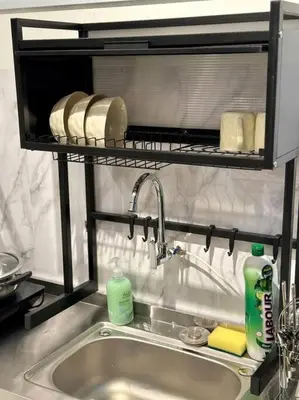 a sink in a kitchen with a shelf above it at Urban Emerald Seaview 6Pax 3Queen 3Room 2Bath 2Carpark with Infinity Pool in Jelutong