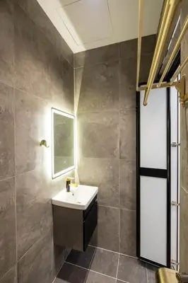 a bathroom with a sink and a mirror at 4Rooms Elegance Dream House - 5Mins to Icon City in Bukit Mertajam
