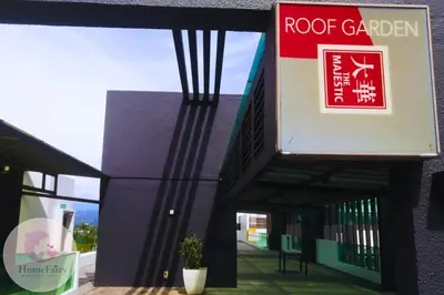 a building with a sign for a roof garden at The Majestic Condo Ipoh Home Fairy 2 in Ipoh