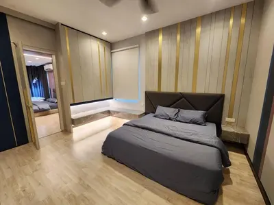 a bedroom with a large bed and a mirror at 5min to juru & bukit minyak industrial semi D in Bukit Mertajam