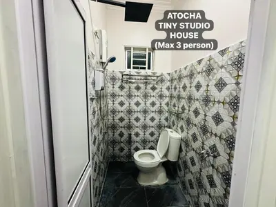 a bathroom with a toilet in a small room at Atocha Tiny Studio House - Temerlok Terong, Perak - max 3 person only in Kampong Salak