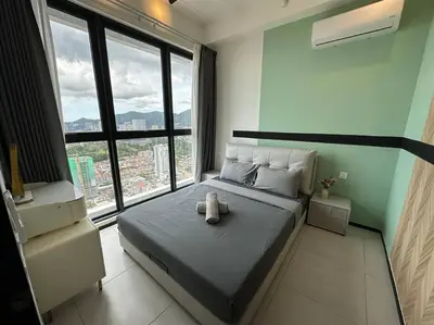 a bedroom with a bed with a teddy bear on it at PICO VR, 3BR 3 queen bed, 2 car park, UrbanSuites by XW Home in Jelutong