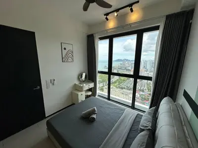 a bedroom with a bed and a large window at PICO VR, 3BR 3 queen bed, 2 car park, UrbanSuites by XW Home in Jelutong
