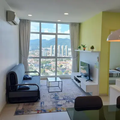 a living room with a view of a city at 29th 2BR1B Straits Garden Suites Georgetown Penang in George Town