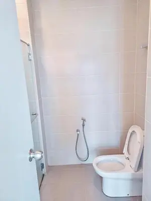 a bathroom with a toilet and a shower at 28th 2BR1B Straits Garden Suites Georgetown Penang in Jelutong
