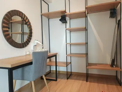 a room with a desk and a mirror at Luxe Romance with Seaview & Bathtub - Jazz Suites by Ocean Luxe in Tanjong Tokong
