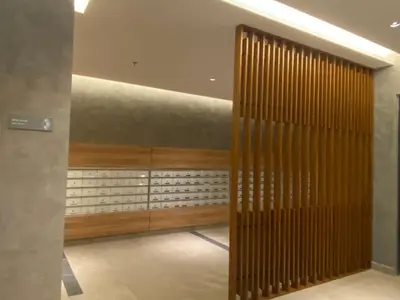 a lobby with a wooden partition in a building at Sunway Onsen Ipoh Tambun Cozy Retreat 8pax in Tambun