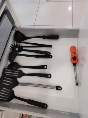 a drawer with a bunch of kitchen utensils at Sea Breeze Haven 2BR Seaview w Bathtub 海风乐园海景套房 by Minsù in Tanjong Tokong