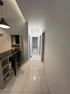 a hallway with a kitchen and a dining room at The Horizon Ipoh 3BR MAGNOLIA -by Goswell in Ipoh