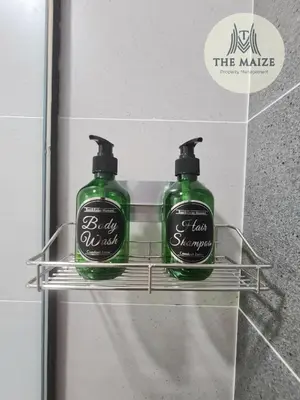 two bottles of soap on a shelf in a bathroom at The Cove Hillside Residence Ipoh-Nature On Earth in Ipoh
