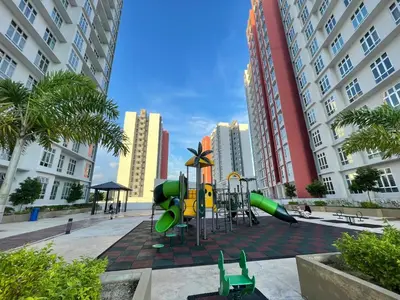 a playground in a city with tall buildings at the Anderson Ipoh 2BR by Goswell in Ipoh