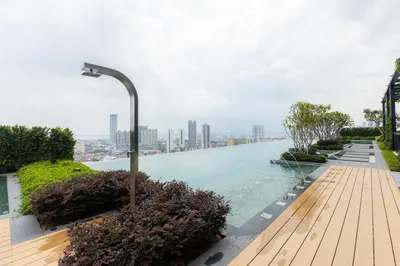 a swimming pool on the roof of a building at Beacon Executive Suite by MAY in George Town