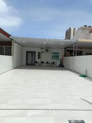 a large patio with tables and chairs on a building at Penang Georgetown Jelutong Luxury House 1-12Pax in Jelutong