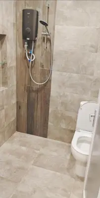 a bathroom with a toilet and a shower at Penang Georgetown Jelutong Luxury House 1-12Pax in Jelutong